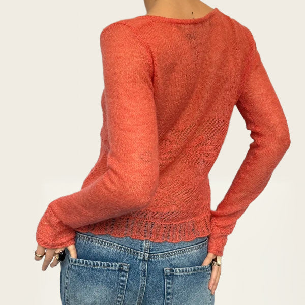 Vest in een zachte koraaltint